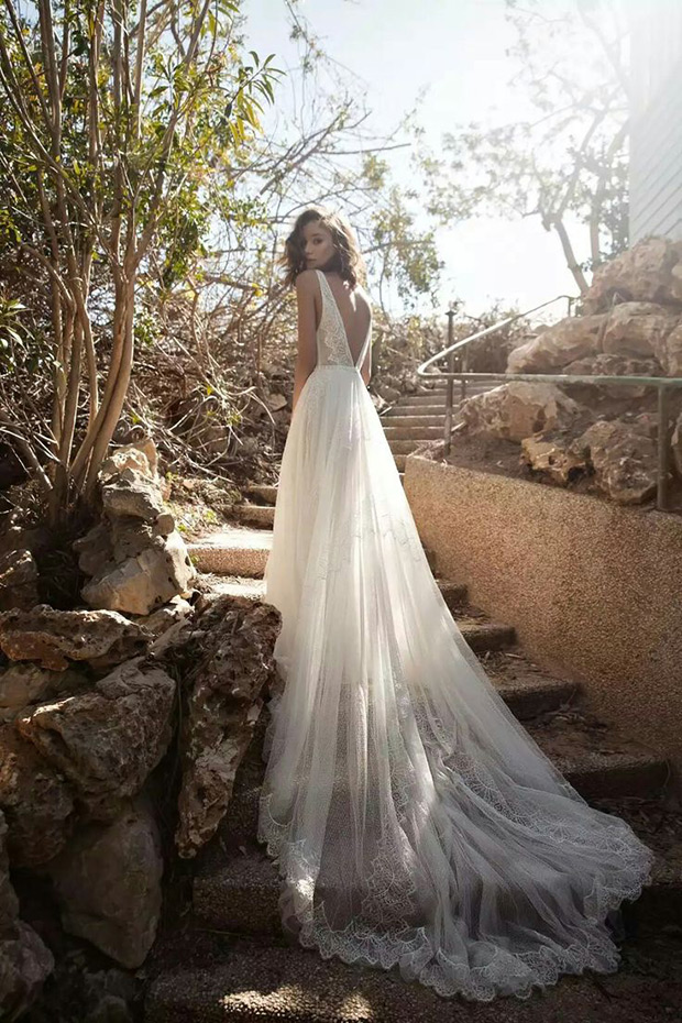 Josephin from Flora wedding dresses 2018 - Deep v-open back with a layered chiffon skirt. -  see the rest of the collection on onefabday.com