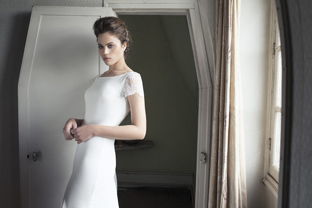 Claris-Cymbeline-Le-Chateau-de-Crevecouer-2018-  High boat neck with embroidered capped sleeves. Fitted sheath gown. To see more visit onefabday.com