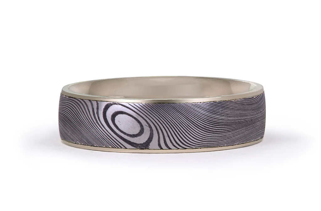 Damascus steel ring, €1.567,95. Photo by McCaul