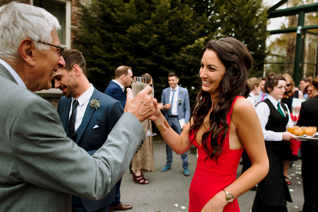 Kilshane House Wedding by SOSAC Photography red wedding dress