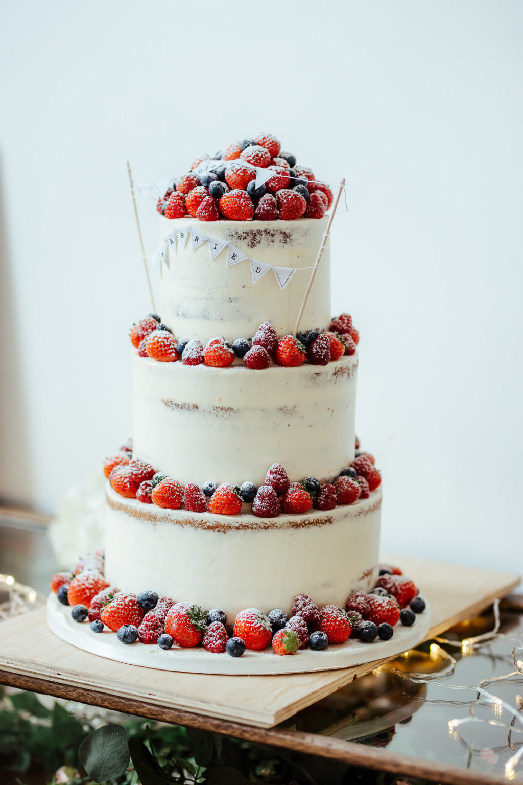 fresh fruit semi-naked wedding cake, Stylish and cool Dublin City Wedding Fallon and Byrne wedding by Olga Hogan Photography (2)