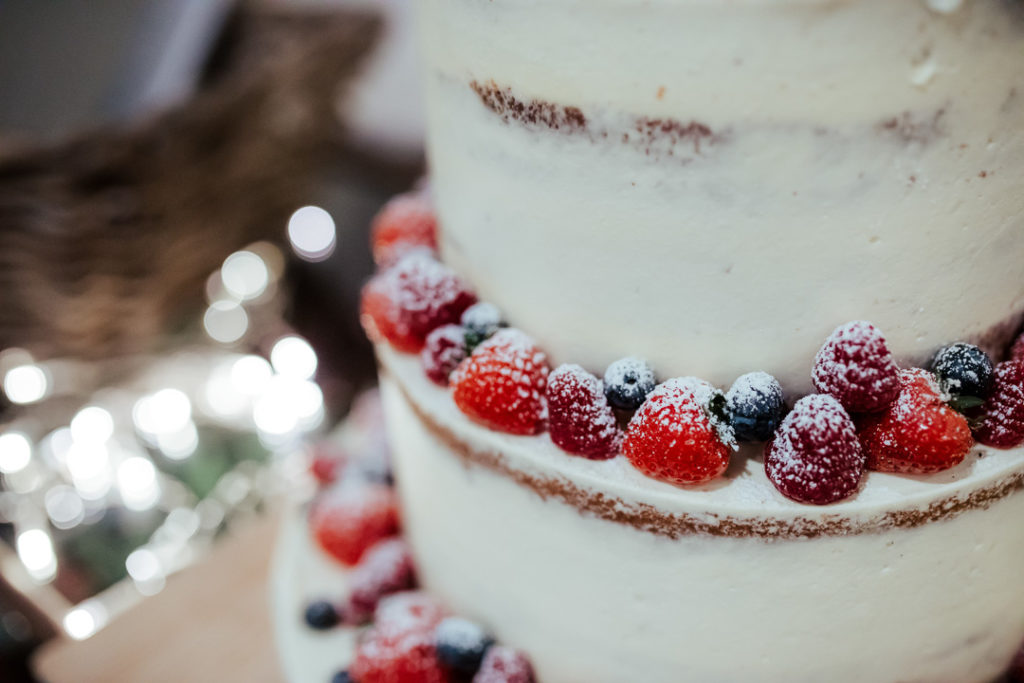 fresh fruit semi-naked wedding cake, Stylish and cool Dublin City Wedding Fallon and Byrne wedding by Olga Hogan Photography (2)