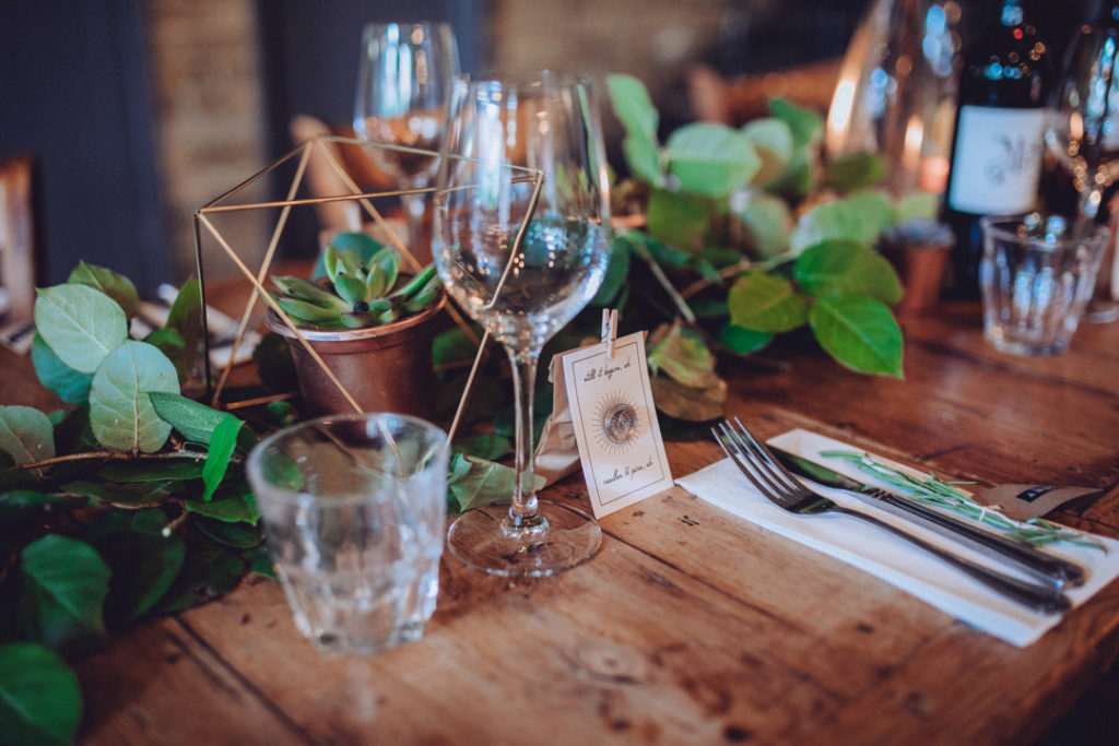 greenery wedding decor, geometric brass decor