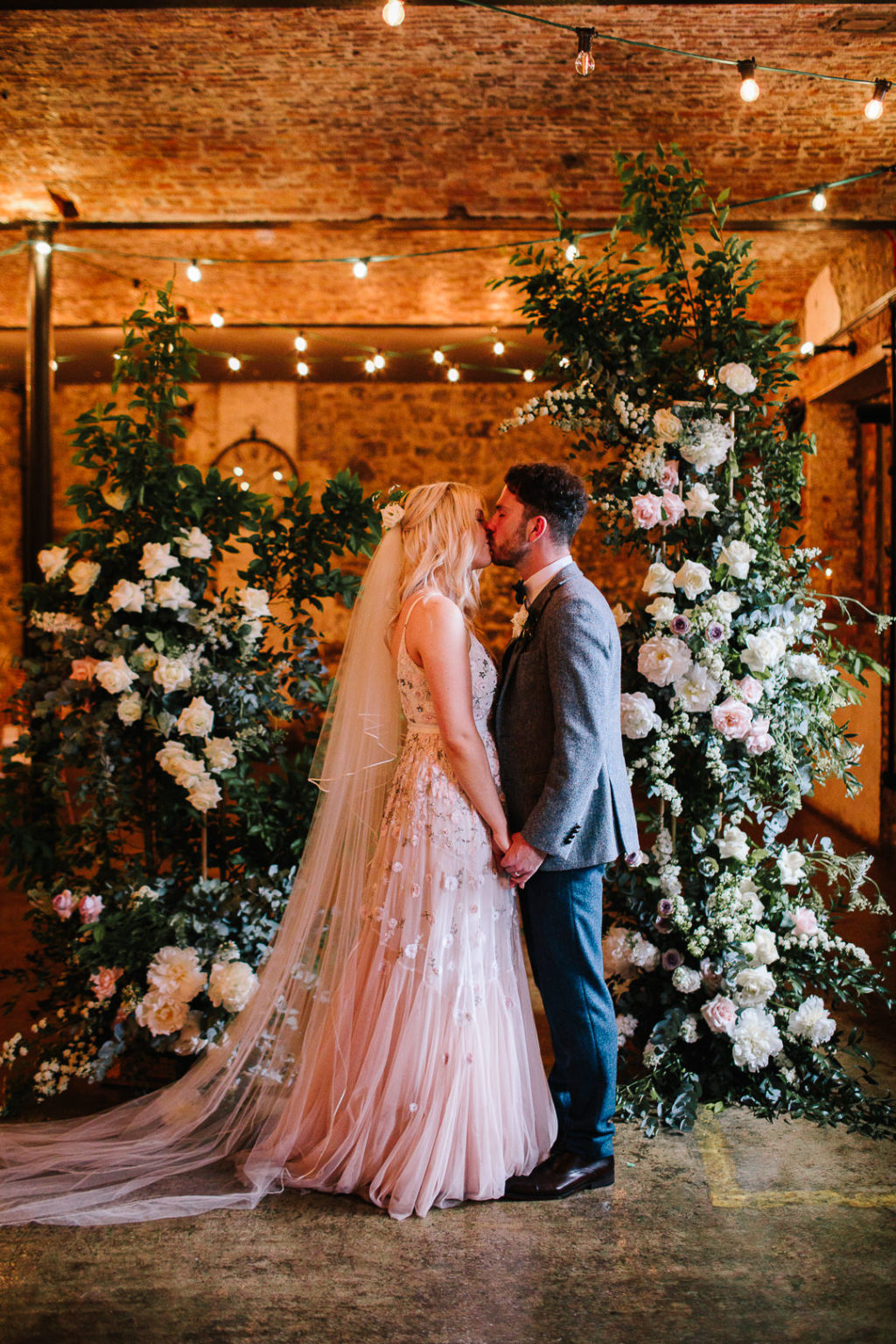 The Wool Tower wedding Antrim Northern Ireland, floral ceremony backdrop