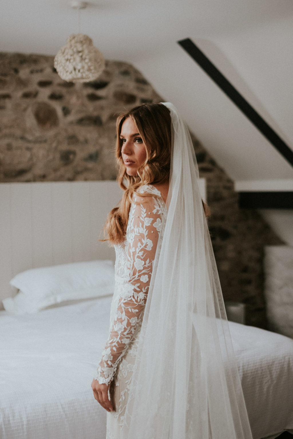 Emma Beaumont atelier wedding dress, lace wedding dress, wedding dress with long sleeves, wedding dress with buttons