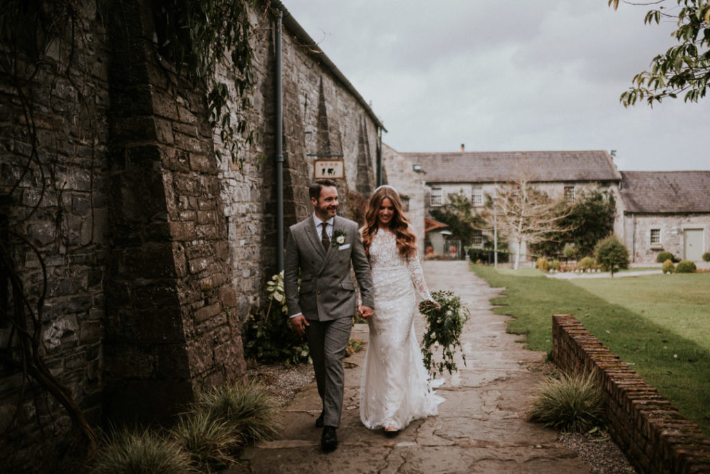 Emma Beaumont atelier wedding dress, lace wedding dress, wedding dress with long sleeves, wedding dress with buttons