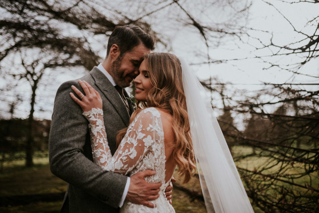 Emma Beaumont atelier wedding dress, lace wedding dress, wedding dress with long sleeves, wedding dress with buttons