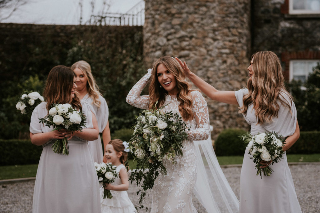 Emma Beaumont atelier wedding dress, lace wedding dress, wedding dress with long sleeves, wedding dress with buttons