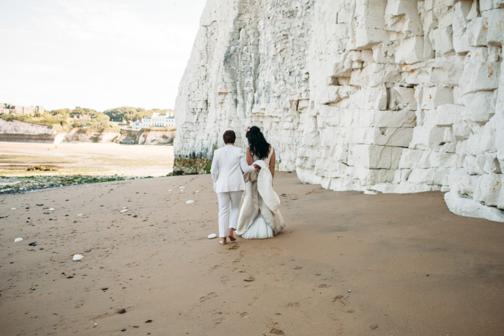 flower crown bride, bridal suit, white wedding suit bride, Beach wedding in Margate UK by Joanna Bongard 