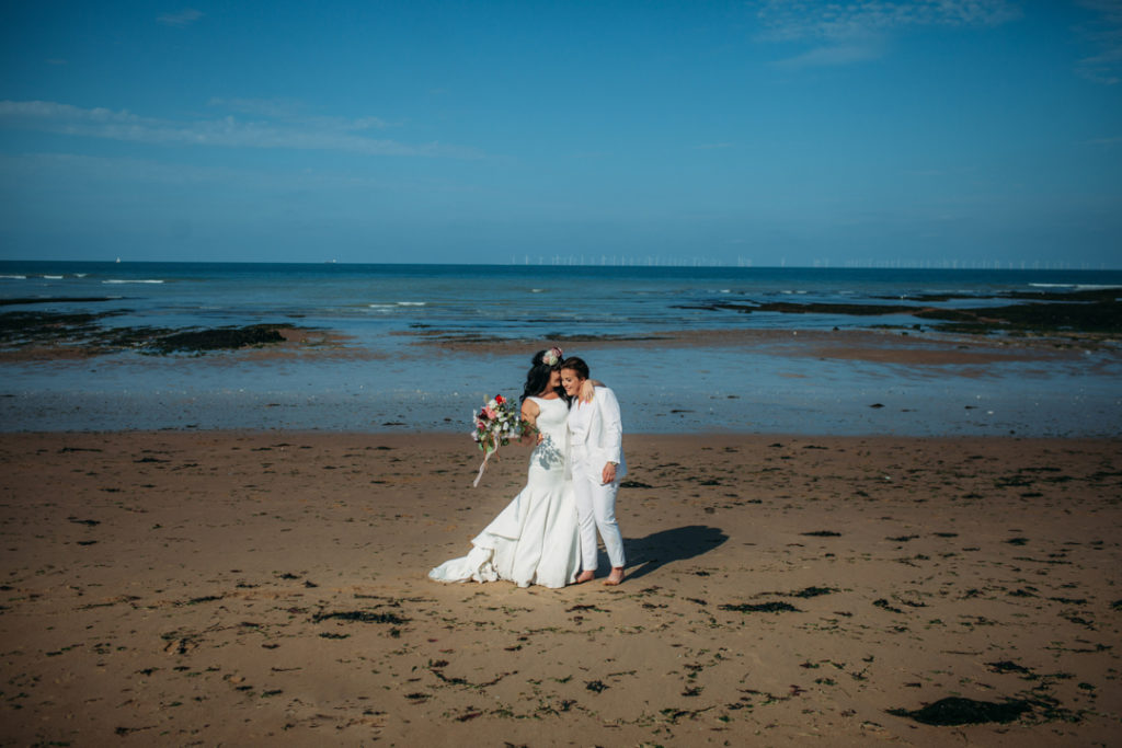 flower crown bride, bridal suit, white wedding suit bride, Beach wedding in Margate UK by Joanna Bongard 