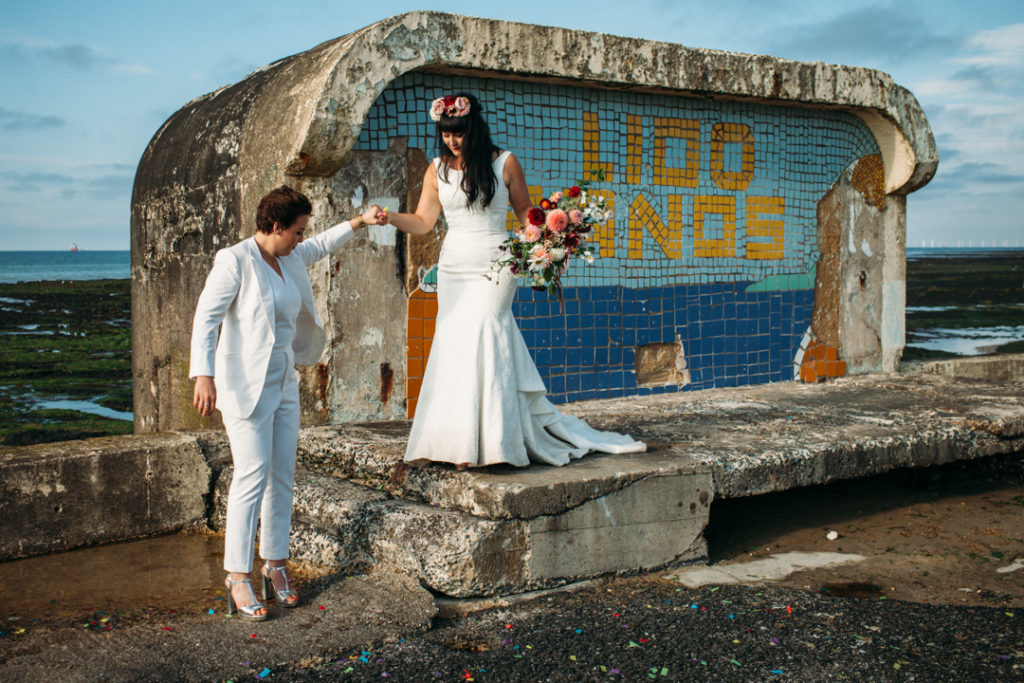 dogs at weddings, pets at weddings, flower crown bride, bridal suit, white wedding suit bride, Beach wedding in Margate UK by Joanna Bongard 