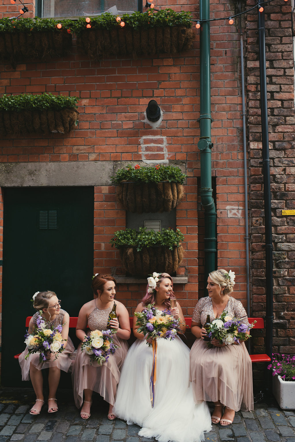 pink hair bride, bombshell wedding dress, vintage bridal style, pink bridesmaids dresses, embellished bridesmaids dresses