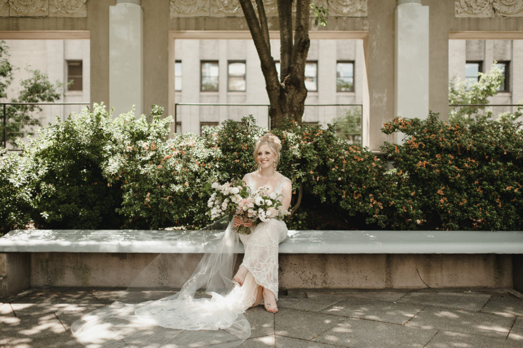 Galia Lahav wedding dress, plunging neckline wedding dress, lace wedding dress, embellished wedding dress, vintage wedding flowers, pink and peach wedding flowers, oversized wedding flowers, oversized wedding bouquet, huge wedding bouquet