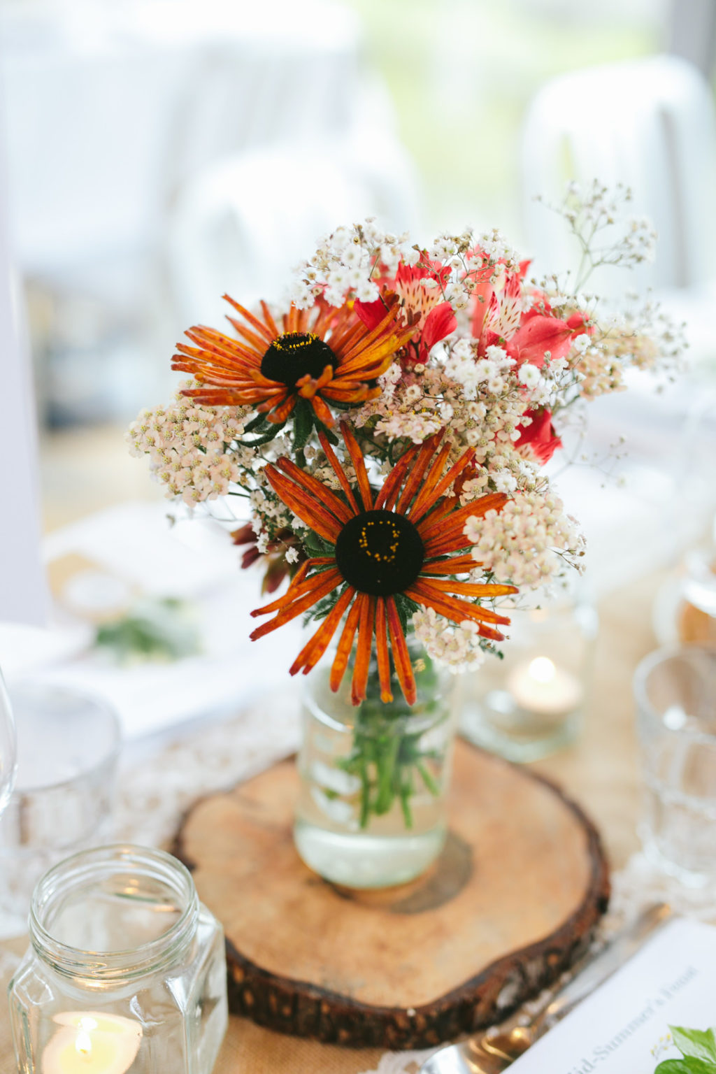 rustic wedding centrepieces, naturalistic wedding flower centrepieces, Airfield Estate wedding, garden wedding