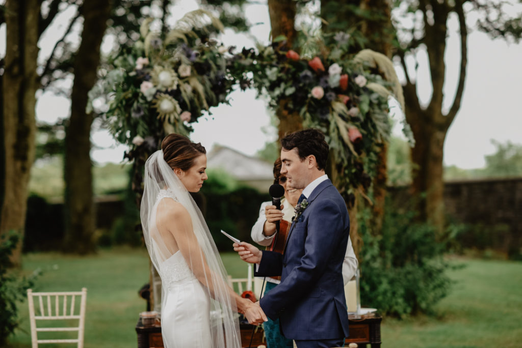 Clonabreany House wedding by Martina California Photography, ceremony flower arch