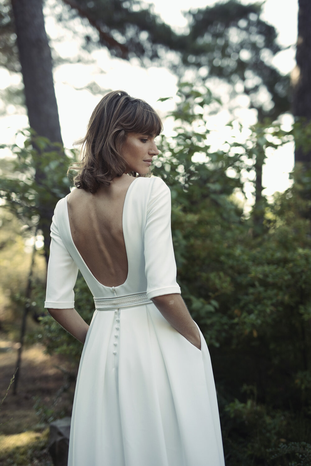 Simple scooped back wedding dress the Salvinio from the 2021 Laure De Sagazan Bridal Collection featured on One Fab Day