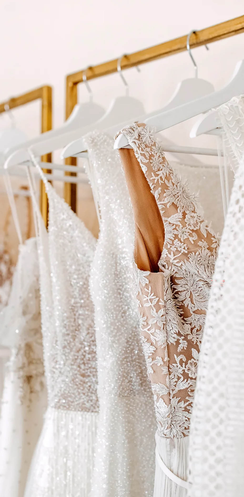 Wedding dresses on a rail