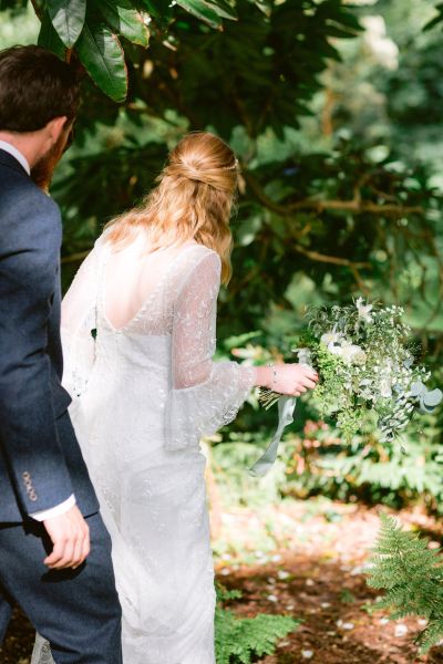 Walking bride groom forest exterior sunny