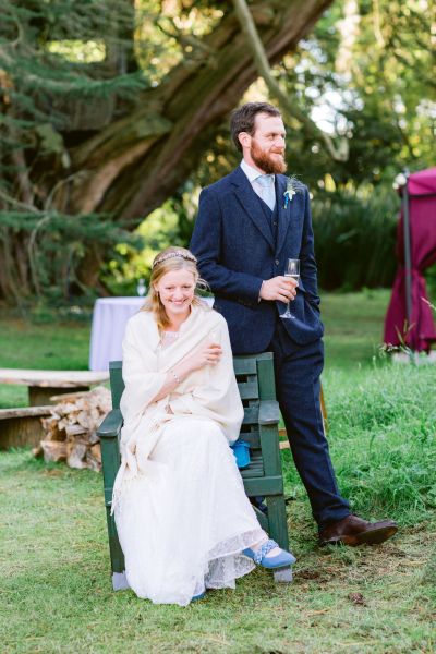 Couple laughing bride groom ceremony speeches champagne prosecco