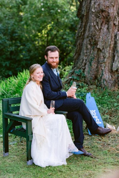 Couple smiling champagne glasses prosecco