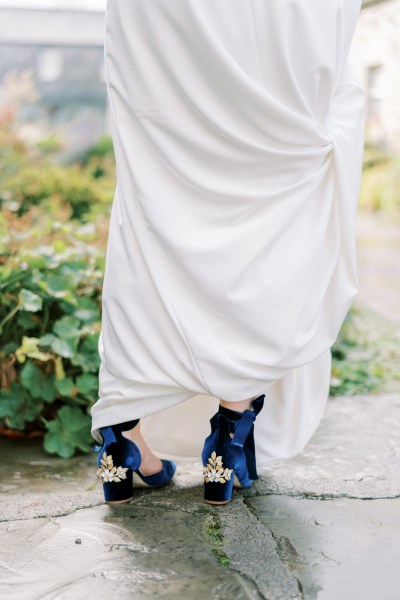 Close up heel suede heels flower detail design dress bride