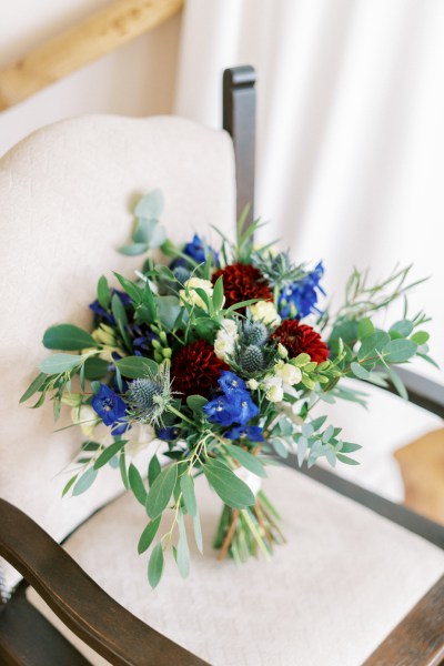 Close up bouquet of flowers roses placed on chair