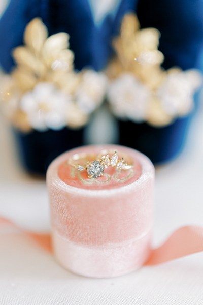 Close up of diamond ring wedding bride heels flower floral suede detail