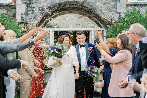 Celebrations after ceremony confetti flowers roses exterior guest shot