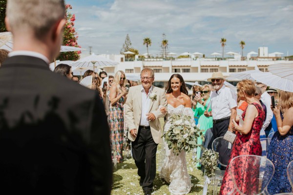 father walking bride down aisle