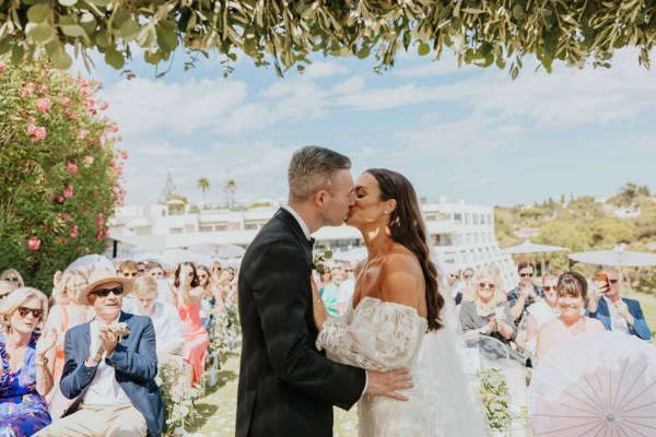 bride and groom kissing