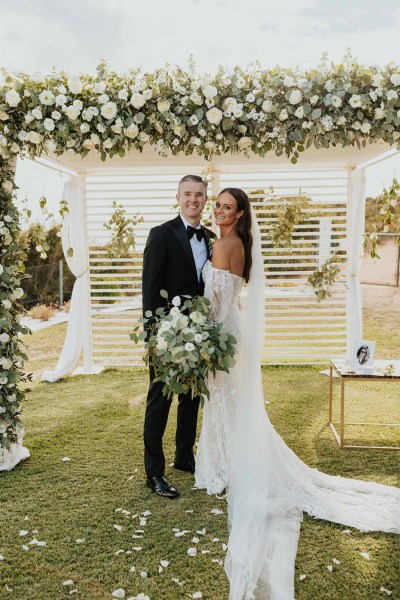 bride and groom portugal wedding floral arch