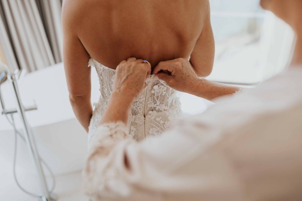 bride getting ready with mom