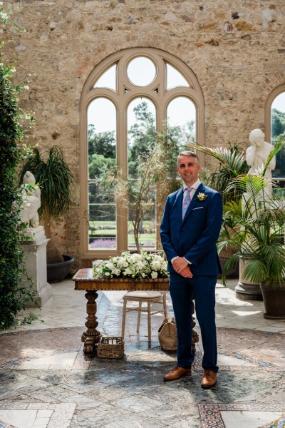 Wedding photography Jane & Alex groom interior ceremony room flowers shoe suit detail