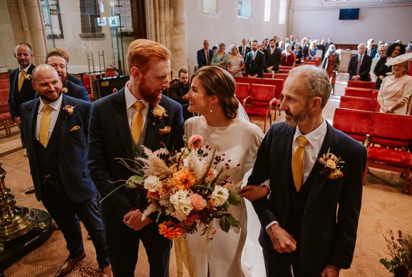 father giving bride away