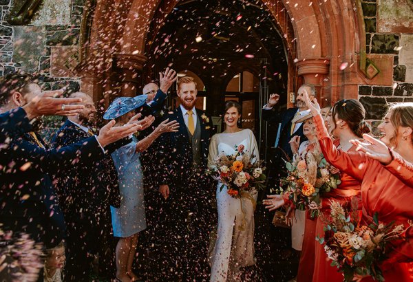 bride and groom confetti church