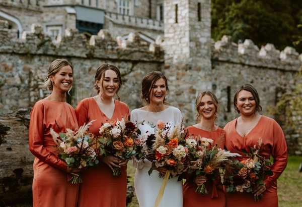 bridal party orange bridedmaids