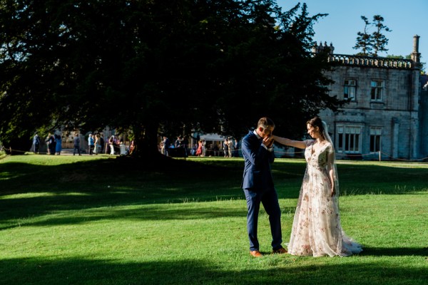 Wedding photography Jane & Alex exterior couple hotel photography summer dress detail hand kiss