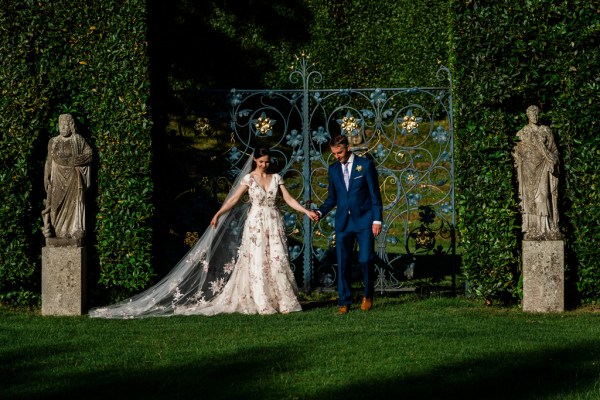 Wedding photography Jane & Alex exterior couple hotel photography summer dress detail gate