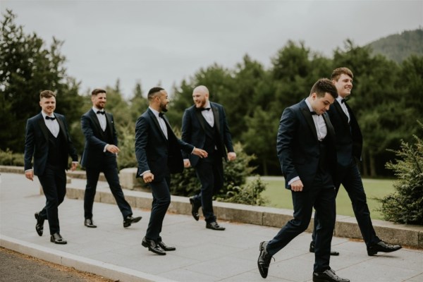 Groomsmen best man groom walking happy laughing photography