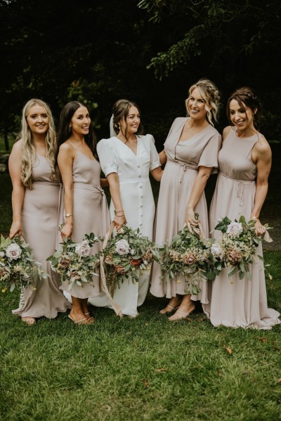 Bride bridesmaids dress rose flower detail smiling laughing