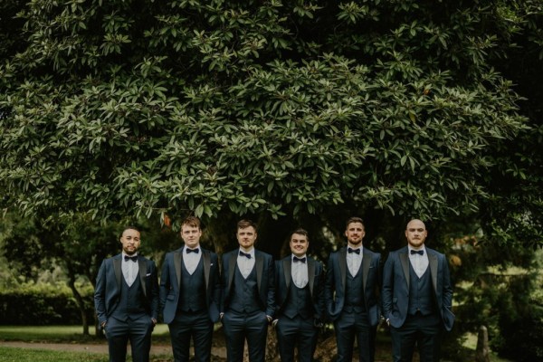 Groomsmen groom best man exterior park shot