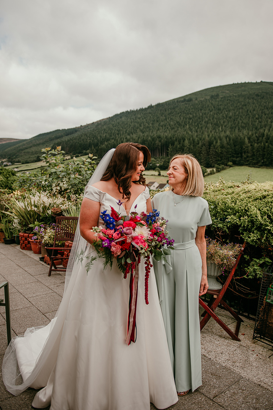 Bridin & Michael Real Wedding bride dress flowers exterior shot mountains mother daughter