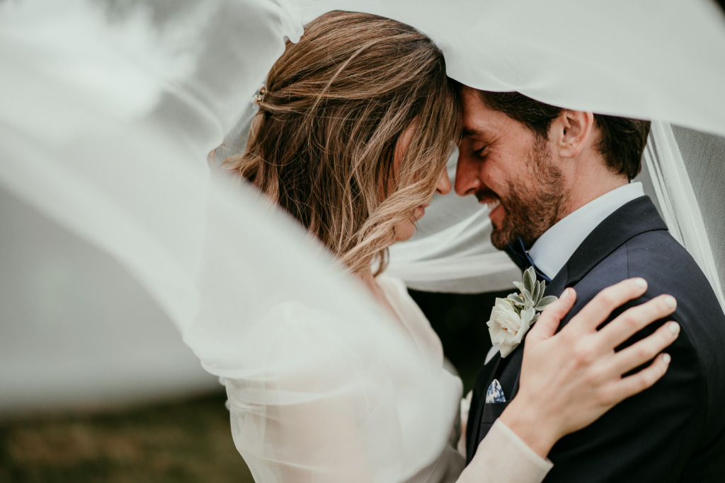 Jemma & Oissine Real Wedding holding each other couple embrace romantic photography