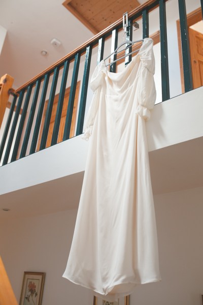 Juniper Barn Photography real weddings bride wedding dress hanging