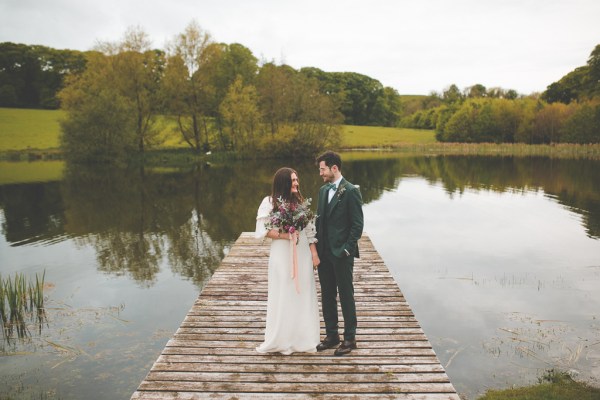 Juniper Barn Photography real weddings bride groom exterior shot lake flowers