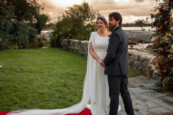 Real Wedding: Tracey & Ultan bride groom exterior ceremony flowers