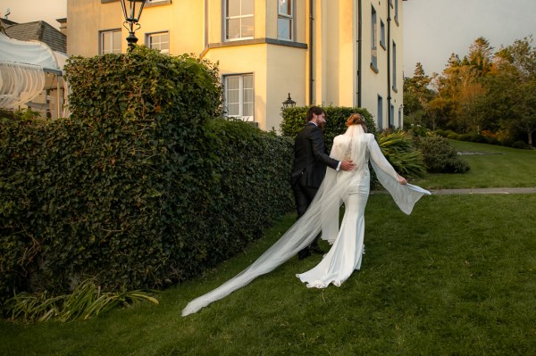 Real Wedding: Tracey & Ultan bride groom exterior sunset hugging embrace