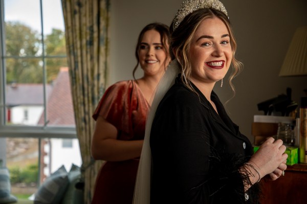 Real Wedding: Tracey & Ultan smiling bride all smiles bridesmaid