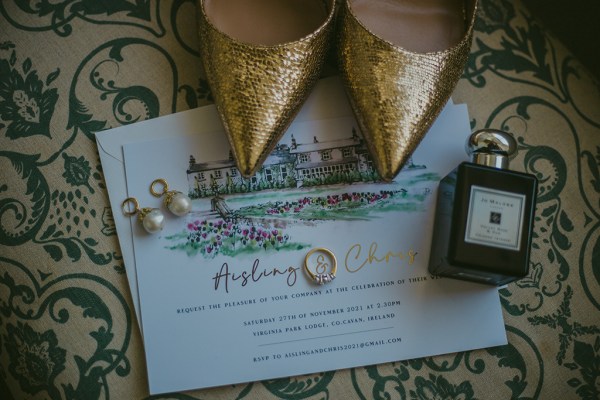 Close-up of wedding ring Aisling and Chris Jo Malone perfume gold sequinned heels