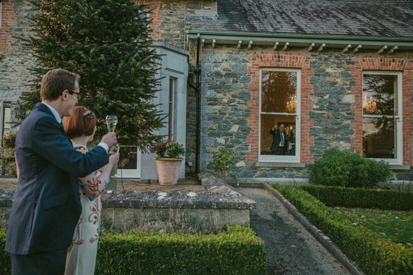 Bride and groom champagne prosecco wine exterior cheers